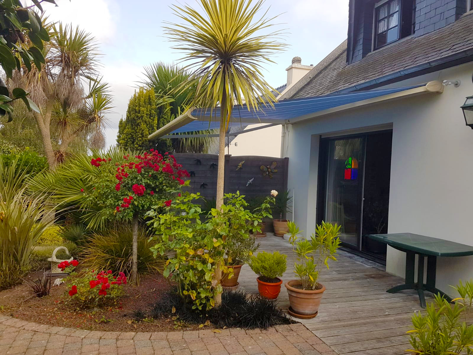 Store banne ouvert terrasse