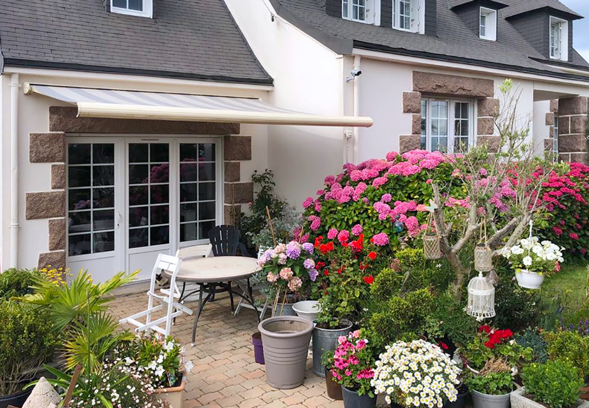 Réalisation Kiclos – Domotique store-banne et porte-fenêtres