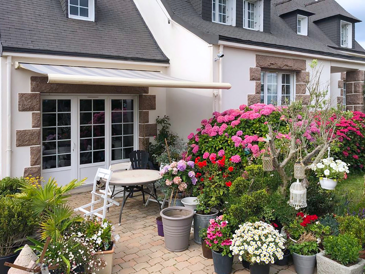 Réalisation Kiclos – Domotique store-banne et porte-fenêtres