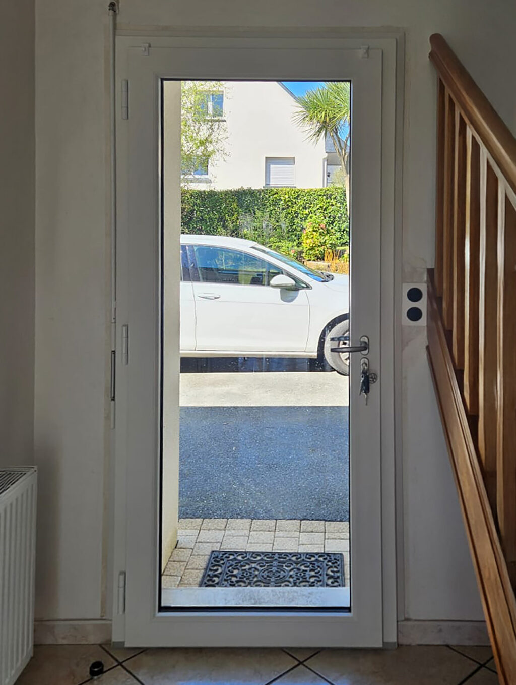Porte d’entrée vitrée PVC blanc intérieur Kiclos